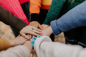 Holding hands for support group in Georgia