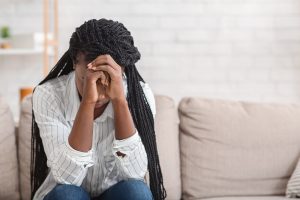 An upset teen sits as she rests her head against her hands. Counseling for Teens in Roswell, GA can offer support when stressed. Learn more about counseling for teens in Roswell, GA today and meet our teen therapists in Atlanta, GA today. 30076