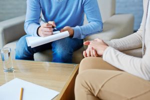 Photo of a woman speaking with a therapist. This photo represents how the therapists at Wellview Counseling offer DBT therapy in Roswell, GA.