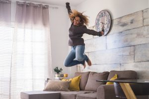 Shows a person jumping for joy. Represents how anxiety treatment roswell, ga and anxiety counseling in alpharetta ga will help you celebrate the small victories.