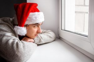 Shows a teen struggling during the holidays. Represents how counseling for teens in alpharetta ga and individual counseling in alpharetta, ga can support your teen.